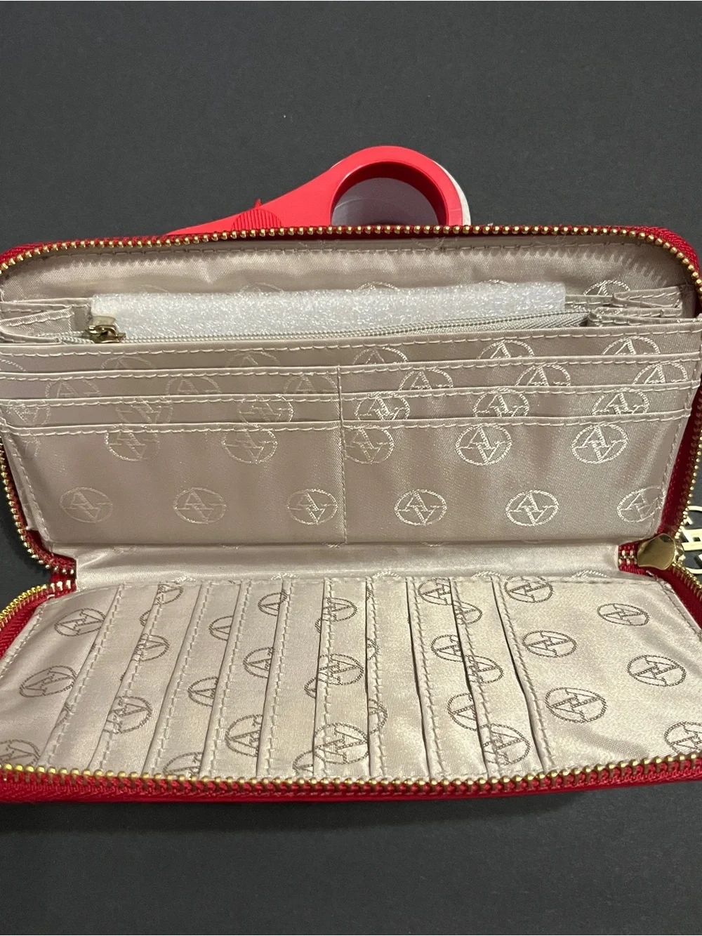 patent leather Adrienne Vittadini Studio Wallet featuring a zip-around